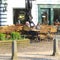 Senior couple chills at a scenic terrace in Dutch style, Lage Vuursche,Netherlands