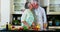 Senior couple cutting vegetables in kitchen 4k