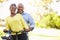 Senior Couple On Cycle Ride In Countryside