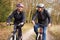 Senior Couple On Cycle Ride In Winter Countryside