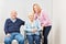 Senior couple and daughter at home care
