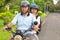 Senior couple drive motorcycle to travel