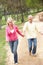 Senior Couple enjoying walk in park