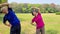 Senior couple exercising outdoors at park