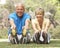 Senior Couple Exercising In Park