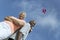 Senior couple flying kite