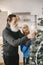 Senior couple with gifts near the Christmas tree