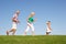 Senior couple, with granddaughter,running