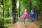 senior couple hiking on the forest park