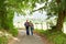 Senior couple on hiking trail in summer