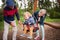 Senior couple with little boy at the playground.