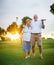 Senior couple out playing golf together portrait