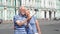 Senior couple on Palace Square do selfie with mobile phone on vacation in Saint Petersburg, Russia