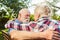 Senior couple on park bench getting to know each other