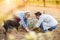 Senior couple planting seedlings