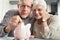 Senior couple puts the coin into the piggybank