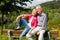 Senior couple sitting on bench