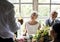 Senior Couple Sitting Cheerful in Wedding Reception