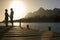 Senior Couple Standing On Edge Of Pier