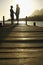 Senior Couple Standing On Edge Of Pier