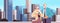 senior couple standing together grandparents spending time together cityscape background