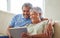 Senior couple, tablet and communication on social media or video call with elderly husband and wife relaxing on the