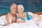 Senior couple taking foam bubble bath