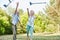 Senior couple throws crutches in the air