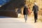 Senior couple walking hand in hand holding