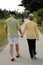 Senior couple walking in park