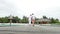 Senior Couple Walking On Wooden Jetty