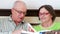 Senior couple watching a photo album