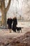 Senior Couple On Winter Walk With Dog