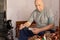 Senior disabled man taking his own blood pressure