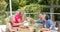 Senior diverse group of women enjoying a meal outdoors