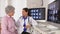 Senior doctor giving positive feedback to mature patient