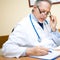 Senior doctor in his studio