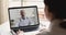 Senior doctor videoconferencing remote patient during telemedicine video call