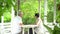Senior elder Asian couple quarantine together in lush natural green environment house