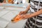 Senior female fashion designers hands holding fabric samples