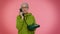 Senior granny gray-haired woman talking on wired vintage telephone of 80s, says hey you call me back