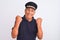 Senior grey-haired man wearing black polo and captain hat over isolated white background very happy and excited doing winner