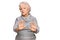 Senior grey-haired woman wearing casual winter sweater moving away hands palms showing refusal and denial with afraid and