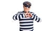 Senior handsome man wearing burglar mask and t-shirt smiling in love doing heart symbol shape with hands