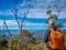 Senior Hiker on a sunny day looking out from Mount Wellington, Tasmania