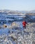 Senior hiker in winter scenery of Rocky Mountains foothills