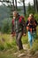 Senior hiking in high mountains with his daughter