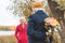 senior husband gifting bouquet of flowers to his wife