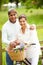 Senior Indian Couple On Cycle Ride In Countryside