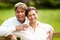 Senior Indian Couple Walking In Countryside